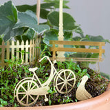 Miniatuur plantenpotdecoratie: fietsavontuur/camping